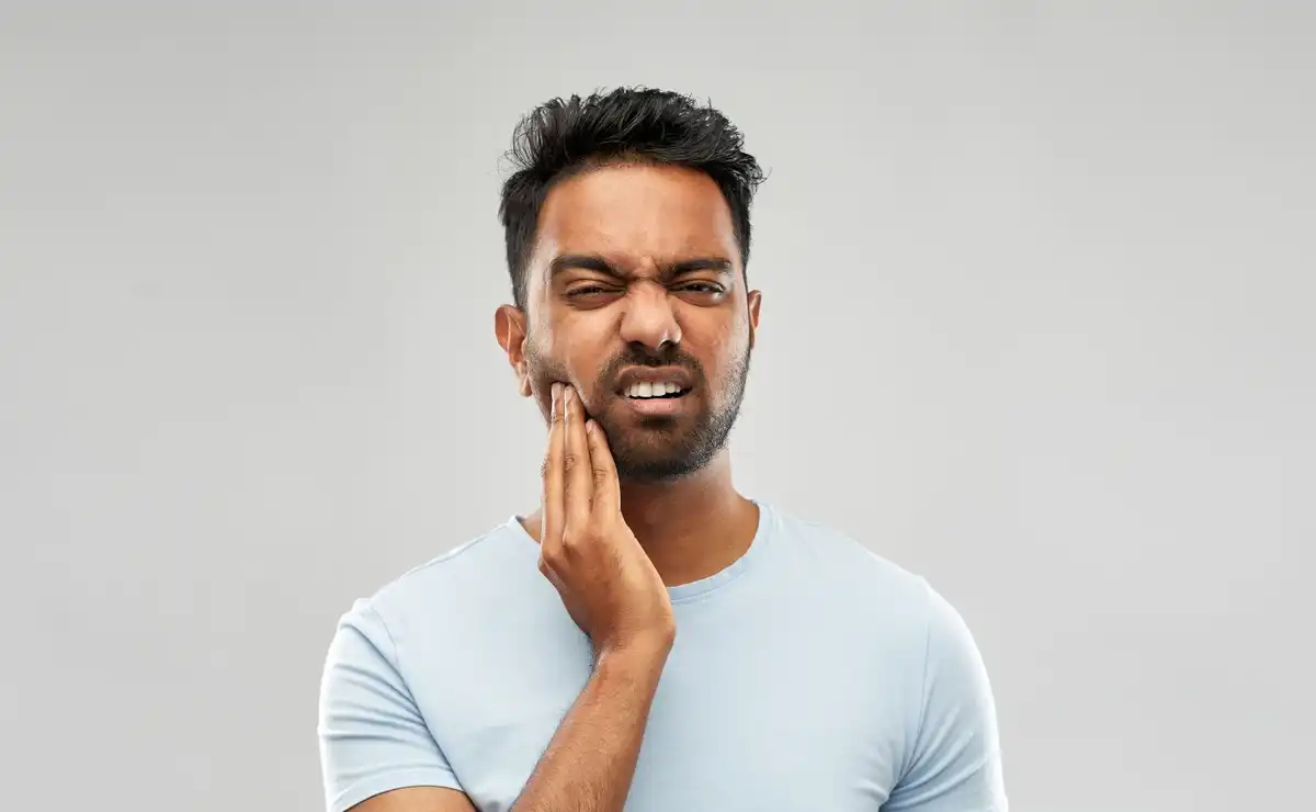 Is Your Dental Crown Giving You Pain? Causes and Treatment