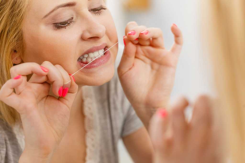 Can You Floss Too Much & How Often Should You Floss?