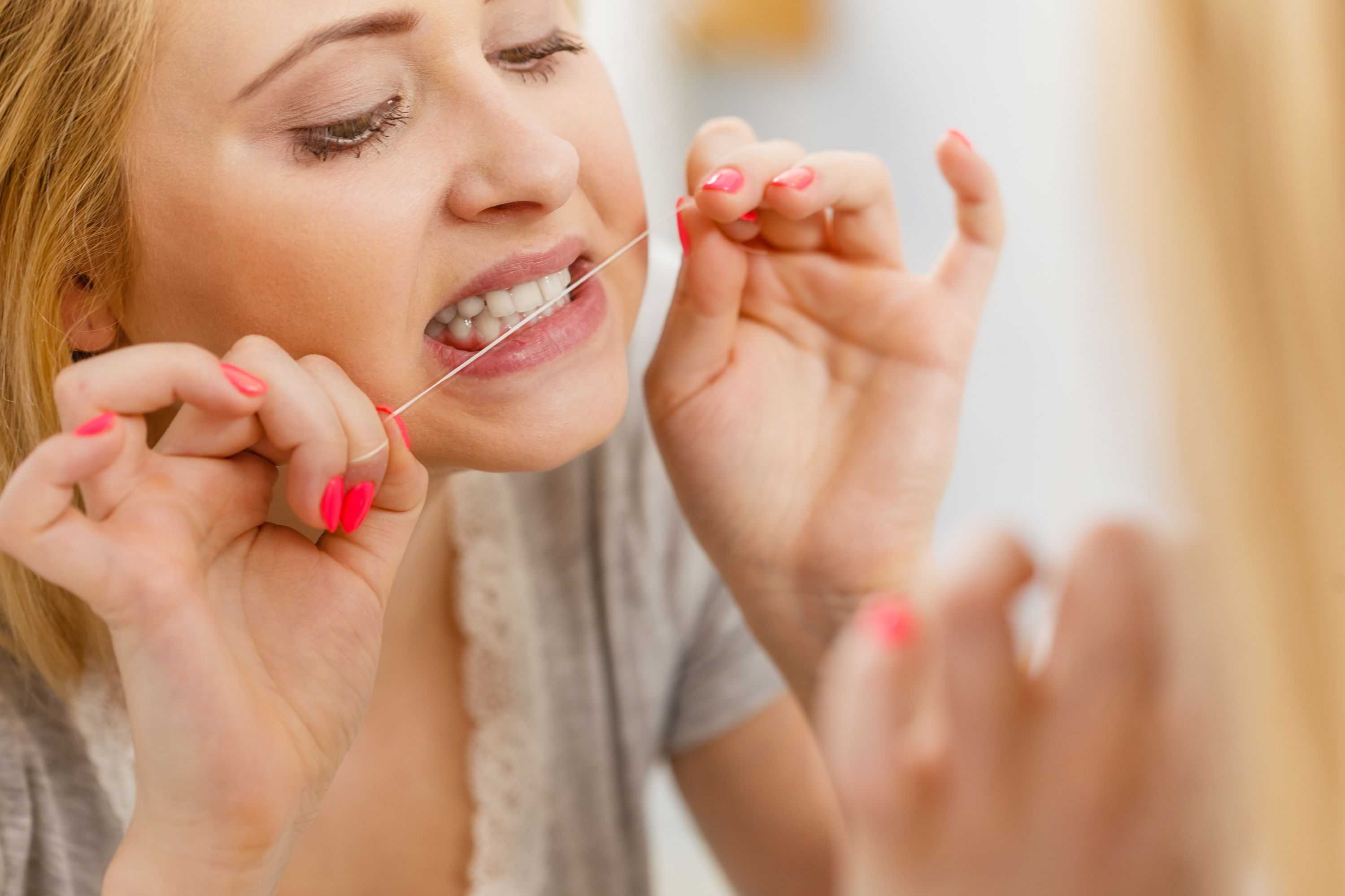 Can You Floss Too Much & How Often Should You Floss? 